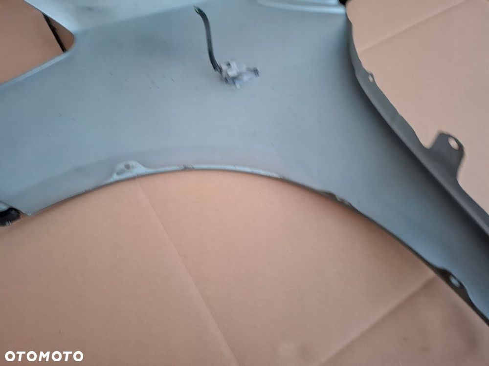 BŁOTNIK PRZEDNI TOYOTA YARIS II ORYGINAŁ - 10