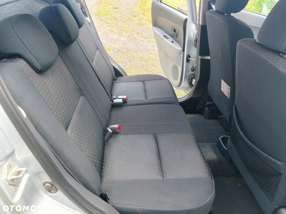 Daihatsu Sirion 1.0 CooLine - 24