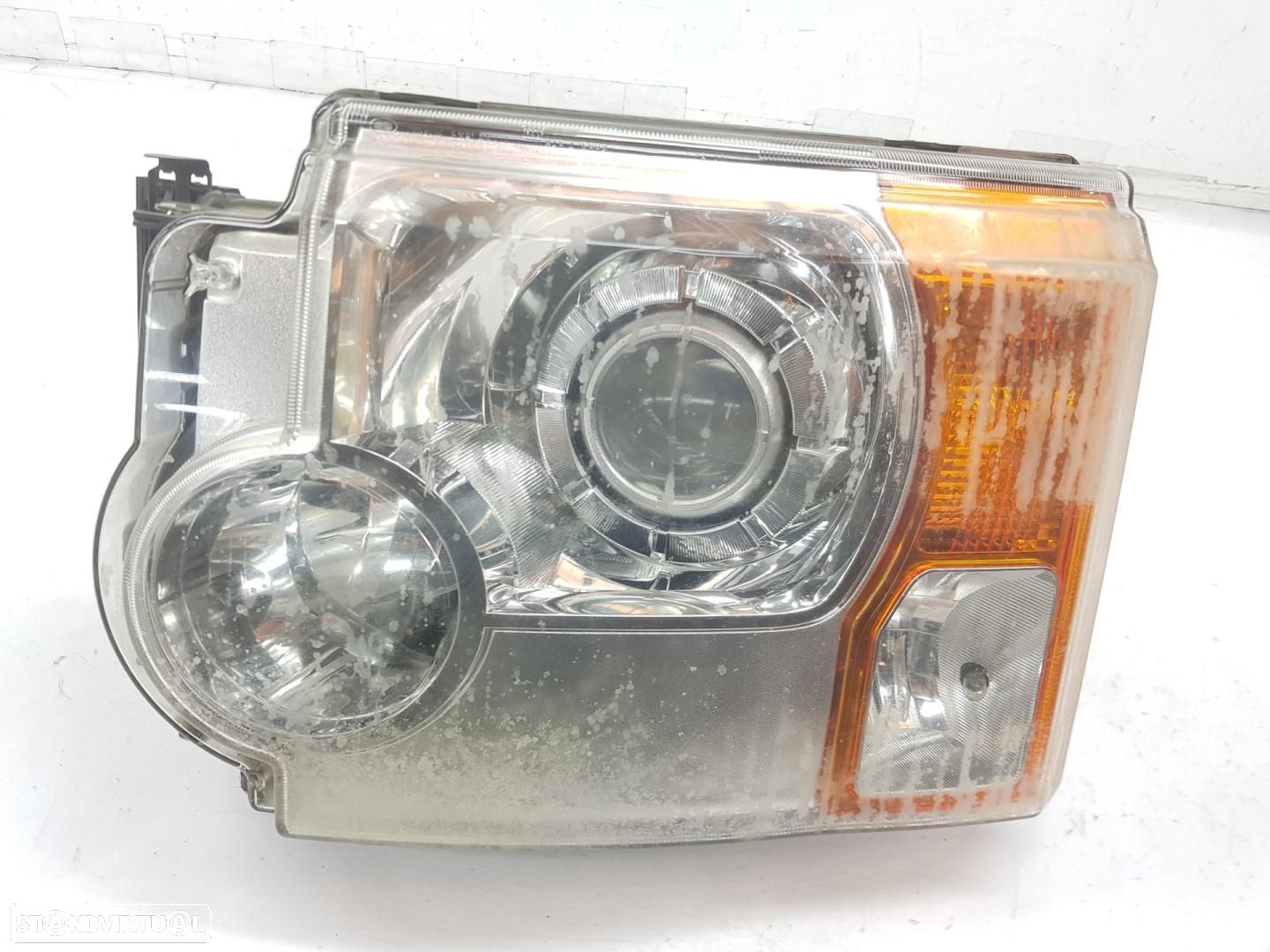 FAROL ESQUERDO LAND ROVER DISCOVERY - 1