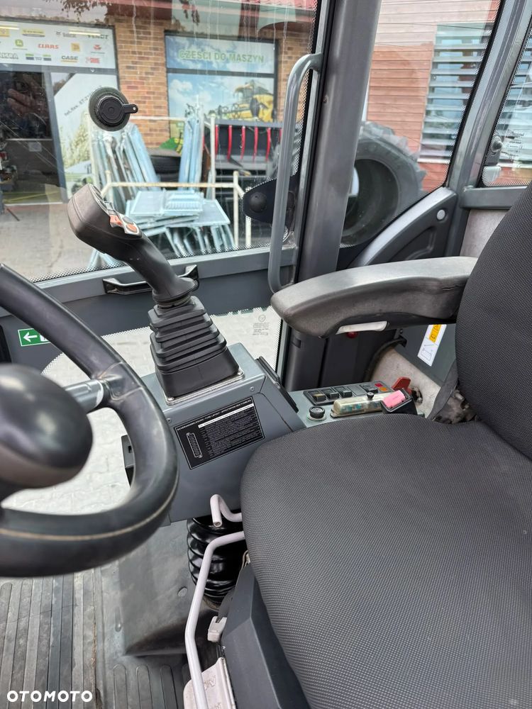 Weidemann 4070  CX 100  SCHAFFER 6390T - 10
