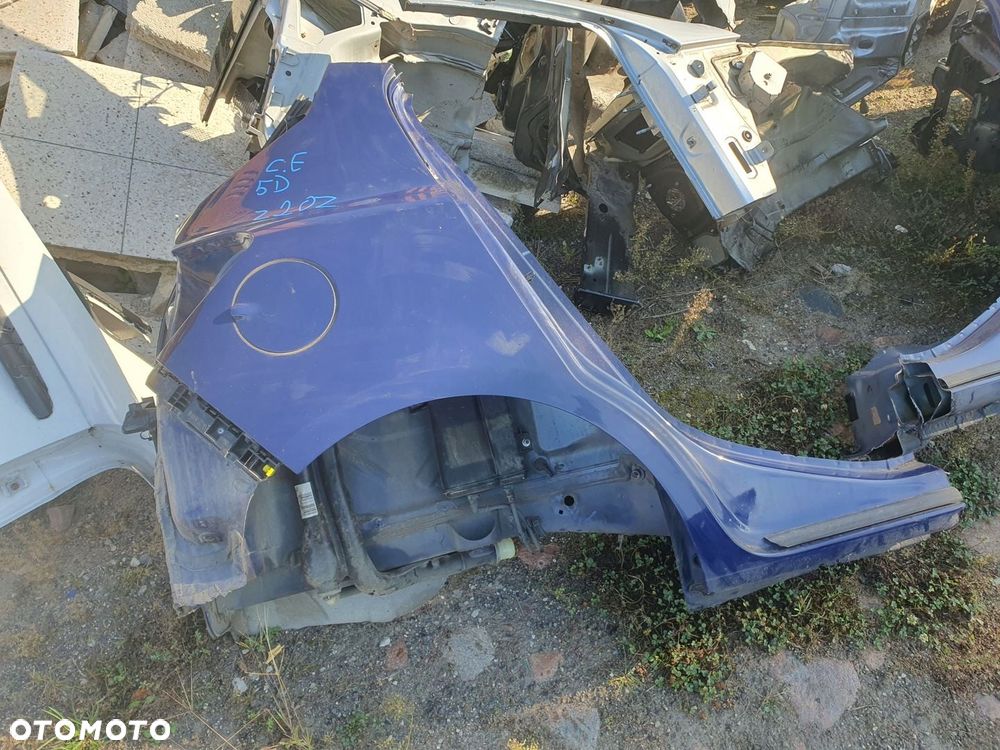 błotnik prawy tył Opel Corsa E - 1