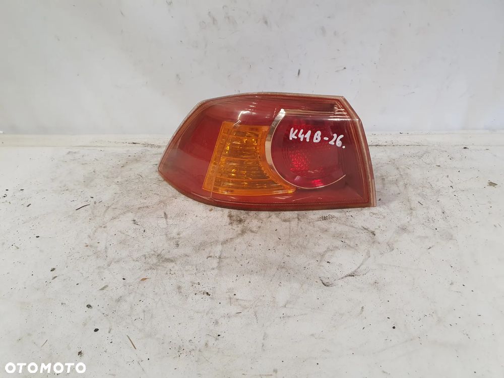 * LAMPA TYLNA LEWA TYŁ LEWO MITSUBISHI LANCER 8 - 1