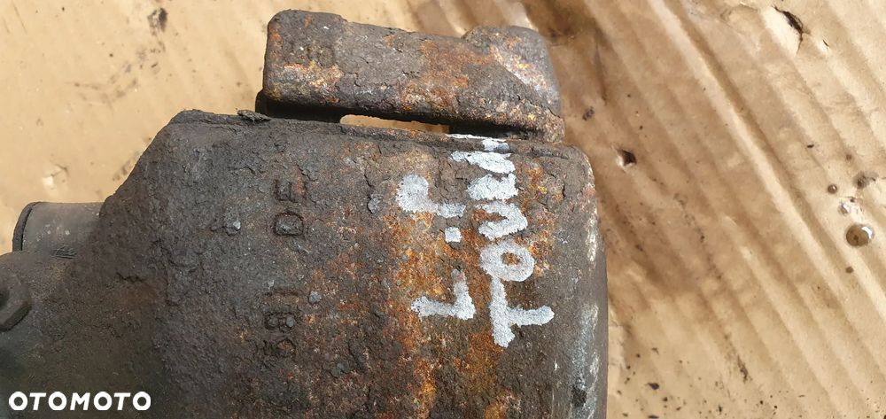 Zacisk hamulcowy lewy przód przedni VW Touran 1T0 - 7