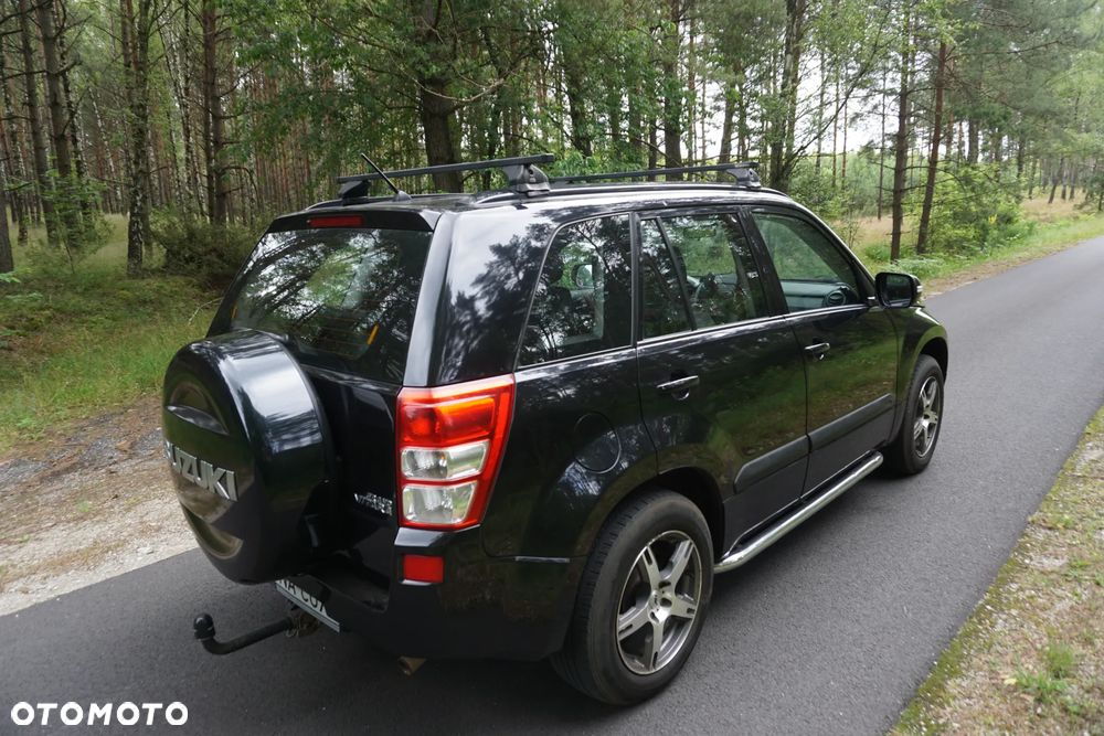 Suzuki Grand Vitara 2.0 - 7