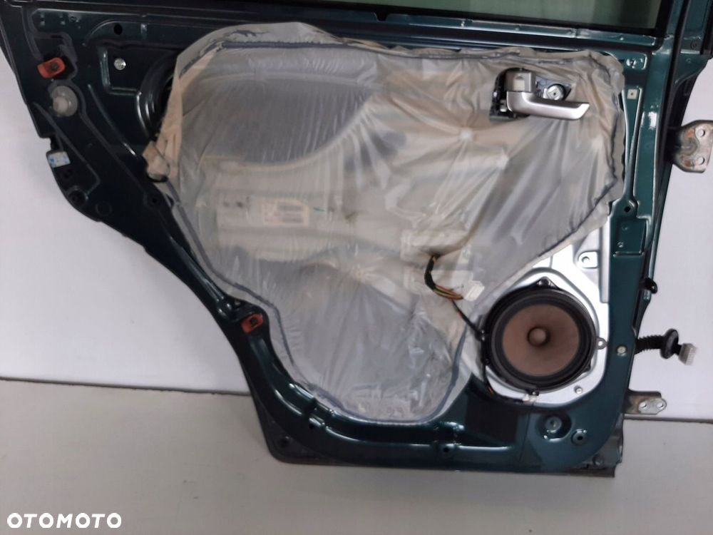 KIA SPORTAGE 2 II LIFT 09R DRZWI LEWY TYL KOD E2 - 16