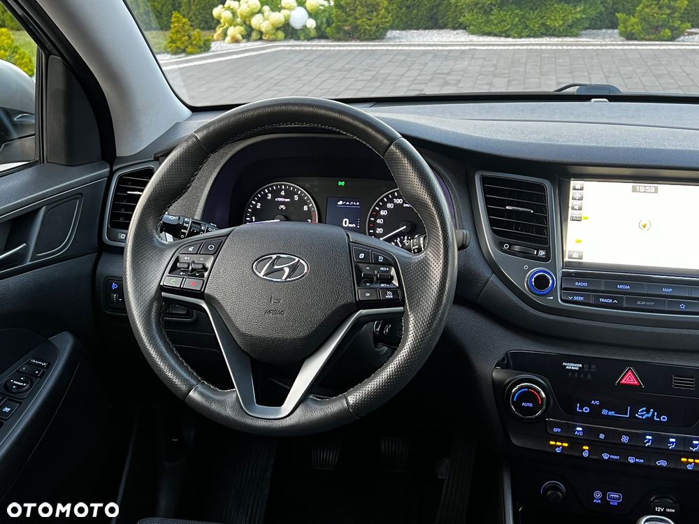 Hyundai Tucson blue 1.6 GDi 2WD Navi - 24