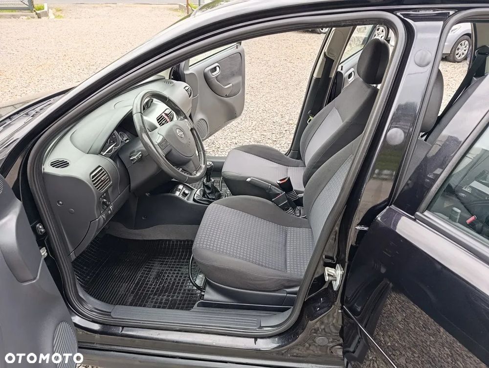 Opel Corsa 1.2 16V Cosmo - 8