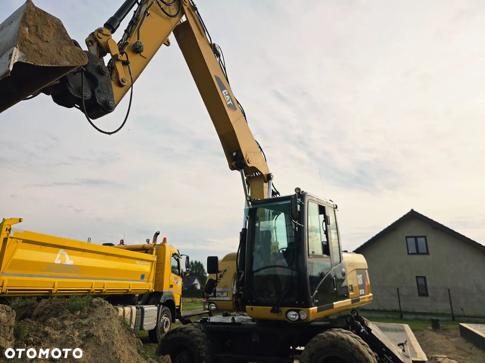 Caterpillar M313 D - 23