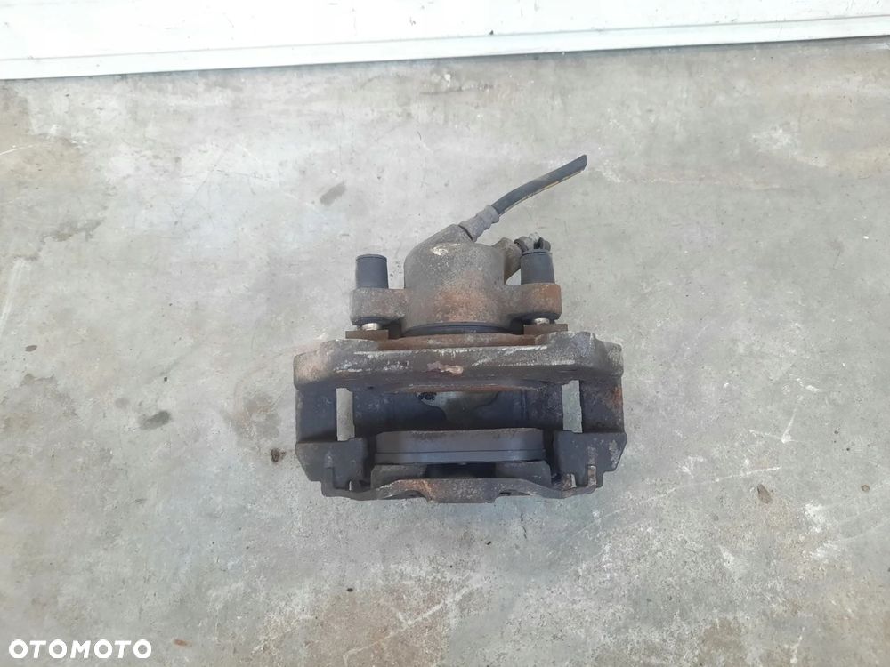 ZACISK LEWY PRZÓD HAMULCOWY BMW 3 E90 E91 2,0 D - 4