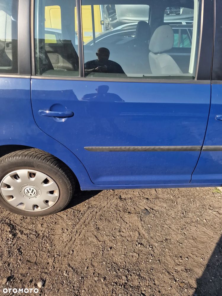 Drzwi prawy tył vw touran 04-15 w kolorze LL5M - 1