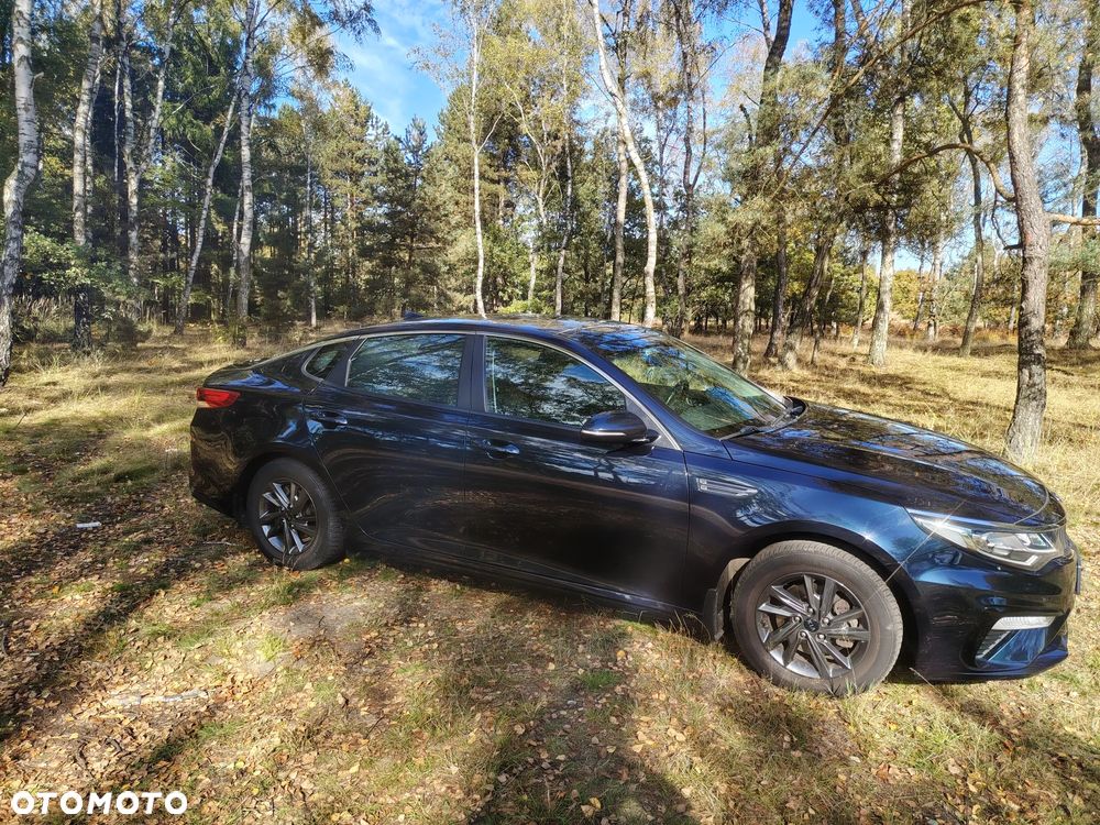 Kia Optima 2.0 L - 8