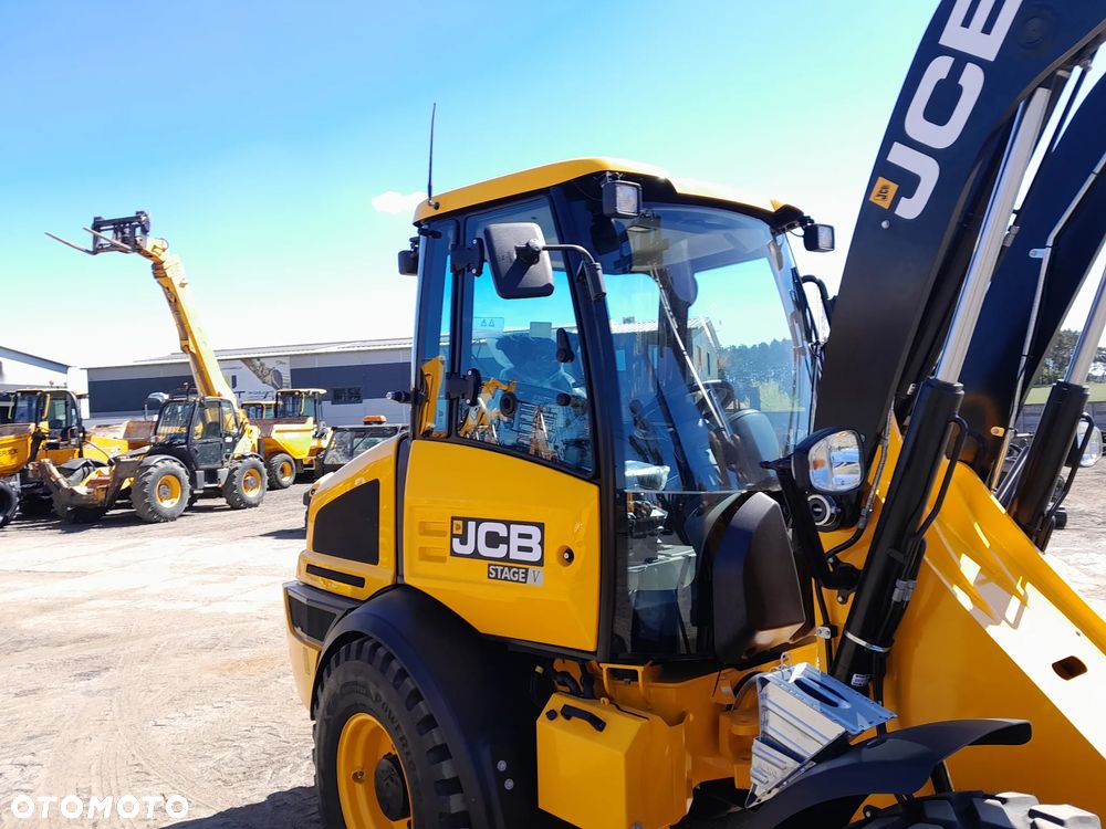 JCB 409 - 12