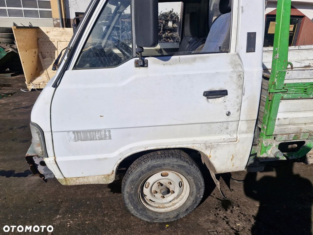 Kia CERES : Kia CERE pojazd na części: maska, zderzak, drzwi, szyby, lusterka, chłodnica.... - 5