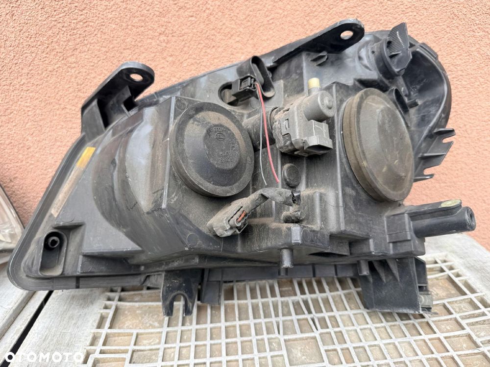 Lampa przednia NISSAN QASHQAI J10 ZWYKŁE KOMPLET EUROPA ORYGINALNE HELLA - 6