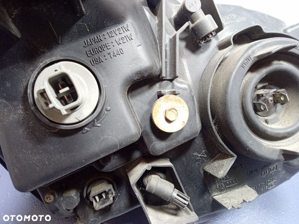 SUZUKI LIANA REFLEKTOR LEWY LAMPA PRZEDNIA EU 100-32662 - 4