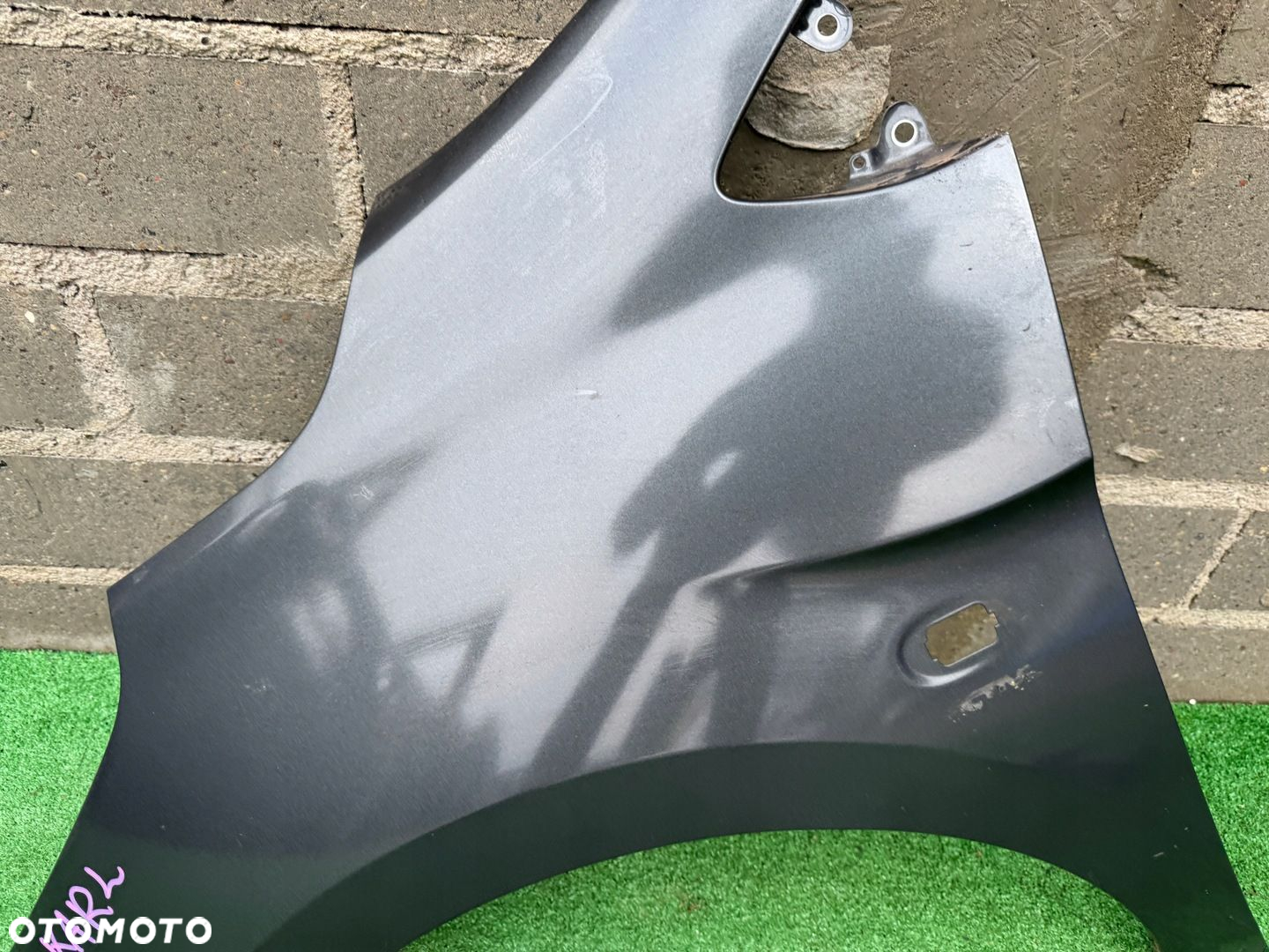 OPEL KARL BŁOTNIK LEWY PRZEDNI BŁ5 - 6