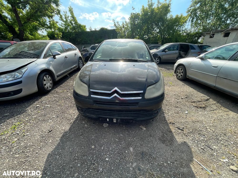 Dezmembrez Citroen C4 I Hatchback 1.4i 16v 65kW 88Cp negru an 2005 - 2