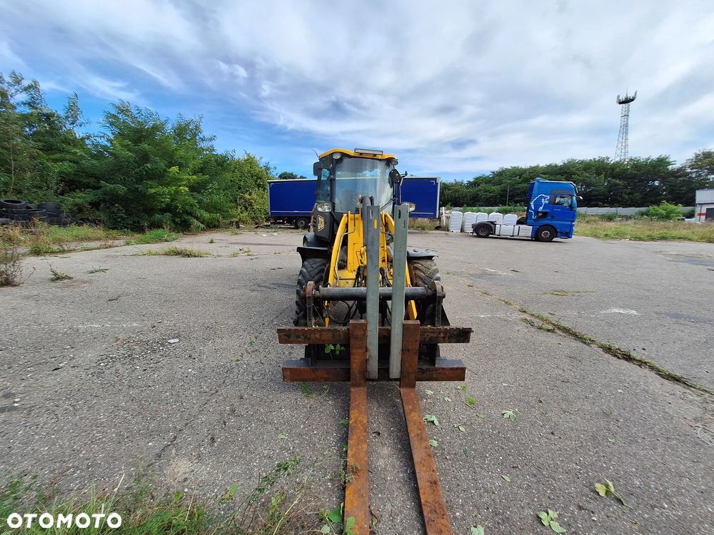 JCB 409 - 5