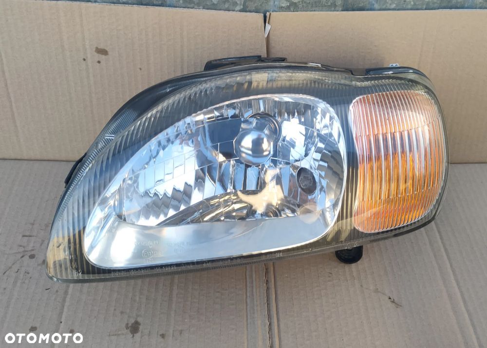 Reflektor lewy Lampa lewa Suzuki Baleno 1998- EU Koito