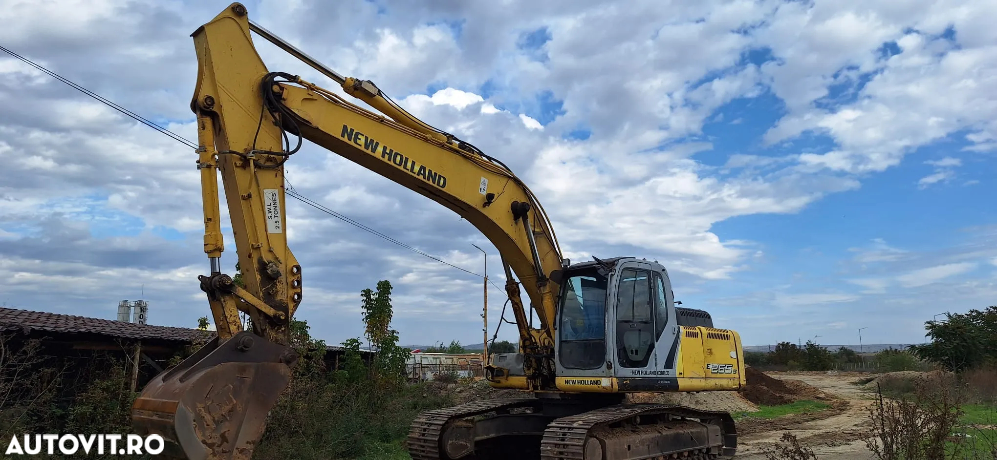 New Holland E 265B - 3