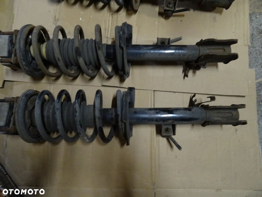 FORD ESCAPE II 08-12R AMORTYZATOR PRZEDNI MCPERSON LEWY PRAWY SPREZYNACZESCI ROZNE