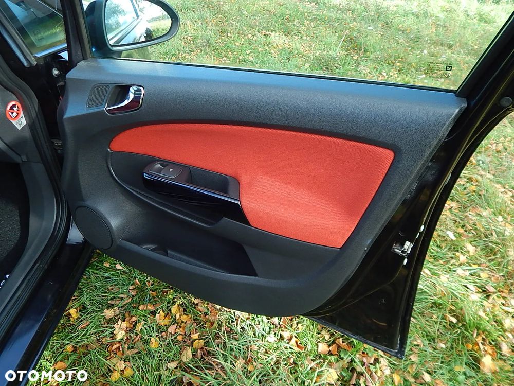 Opel Corsa 1.4 16V Cosmo - 23
