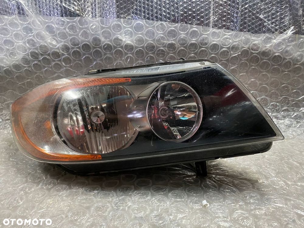 LAMPA PRAWA ZWYKŁA H7 BMW E90 USA 6942726-07 - 1