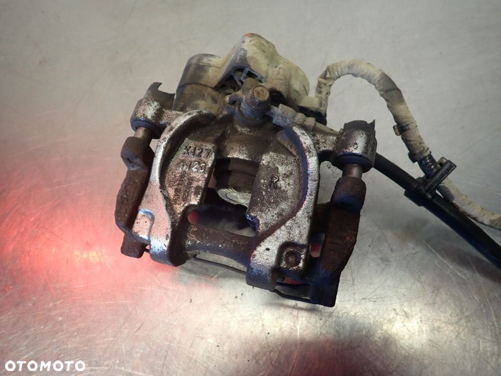 ZACISK HAMULCA PRAWY TYŁ FORD MONDEO V 1.5 - 1