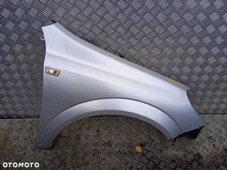 BŁOTNIK PRAWY PRZEDNI OPEL ASTRA H - 1
