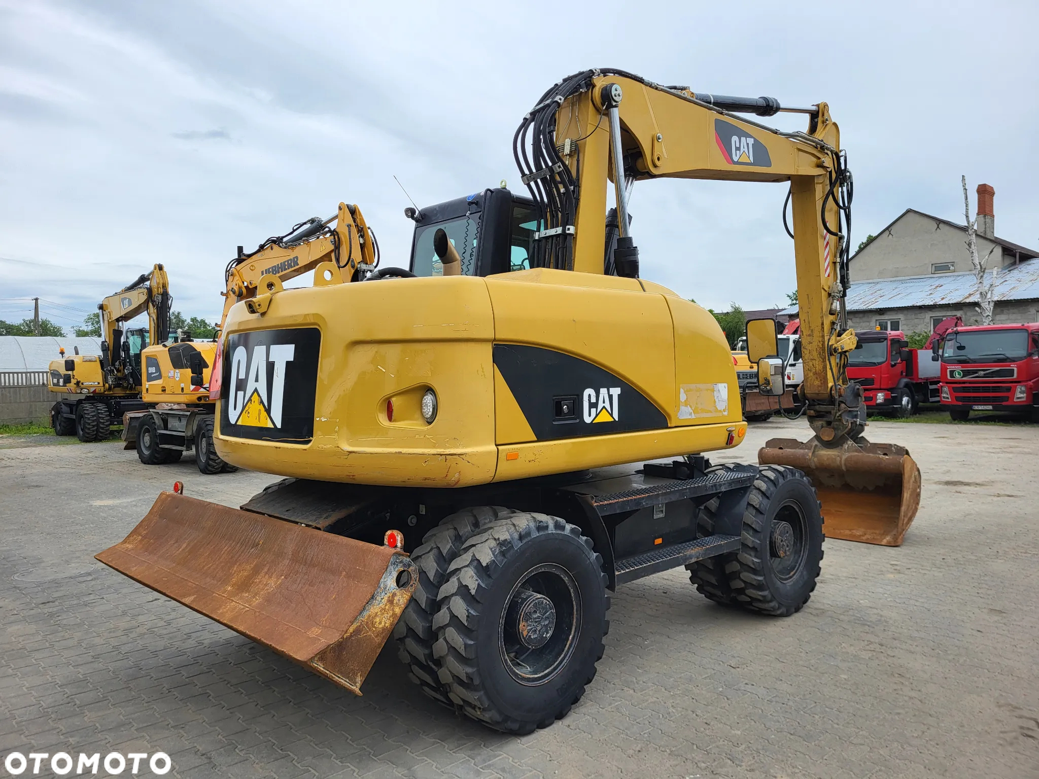 Caterpillar M 313D / z Niemiec / Stan idealny / - 4