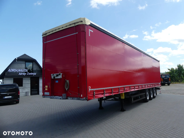 Schmitz Cargobull FIRANKA / STANDARD / OŚ PODNOSZONA / W OCYNKU /