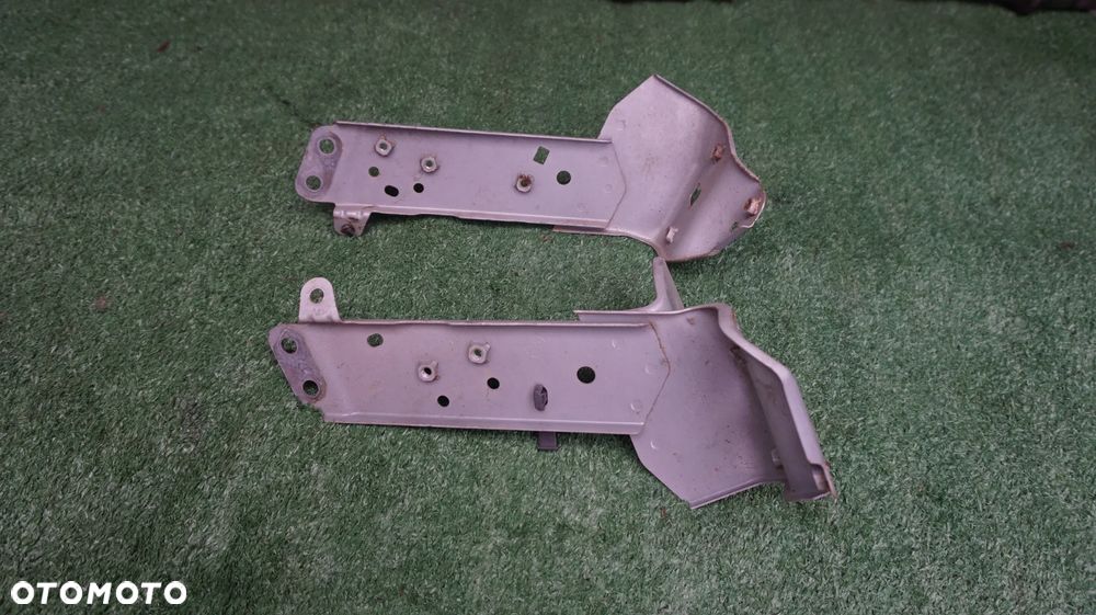 Mazda CX3 CX-3 2.0 B 1.5 D wspornik blotnika lewy prawy 47A