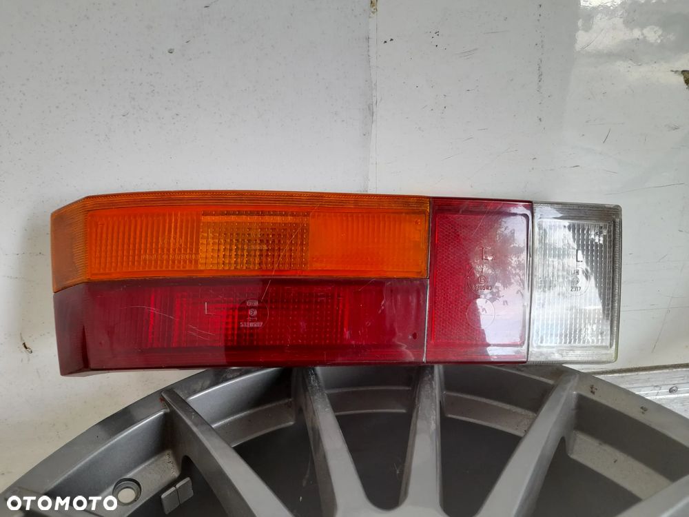 Lampa lewy tył Volkswagen Passat B1 Hella 321945095