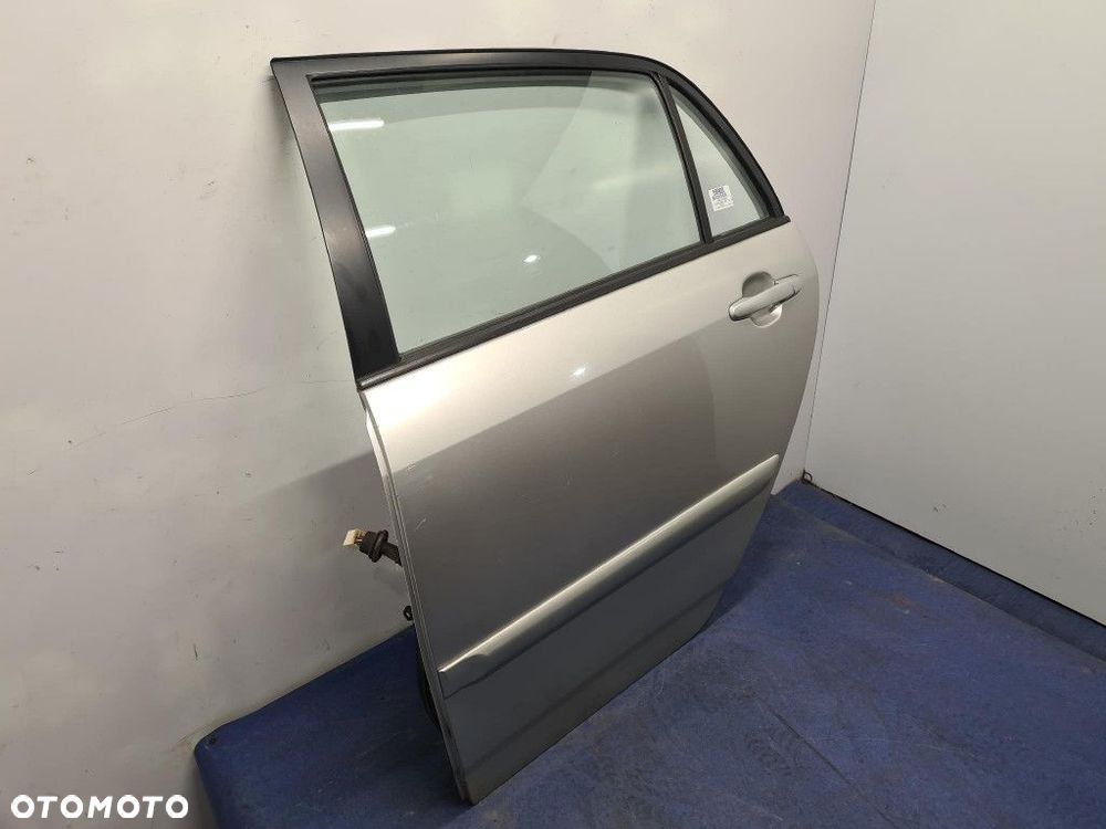 TOYOTA COROLLA E12 1.4 D-4D DRZWI TYŁ LEWE 1C0 - 4