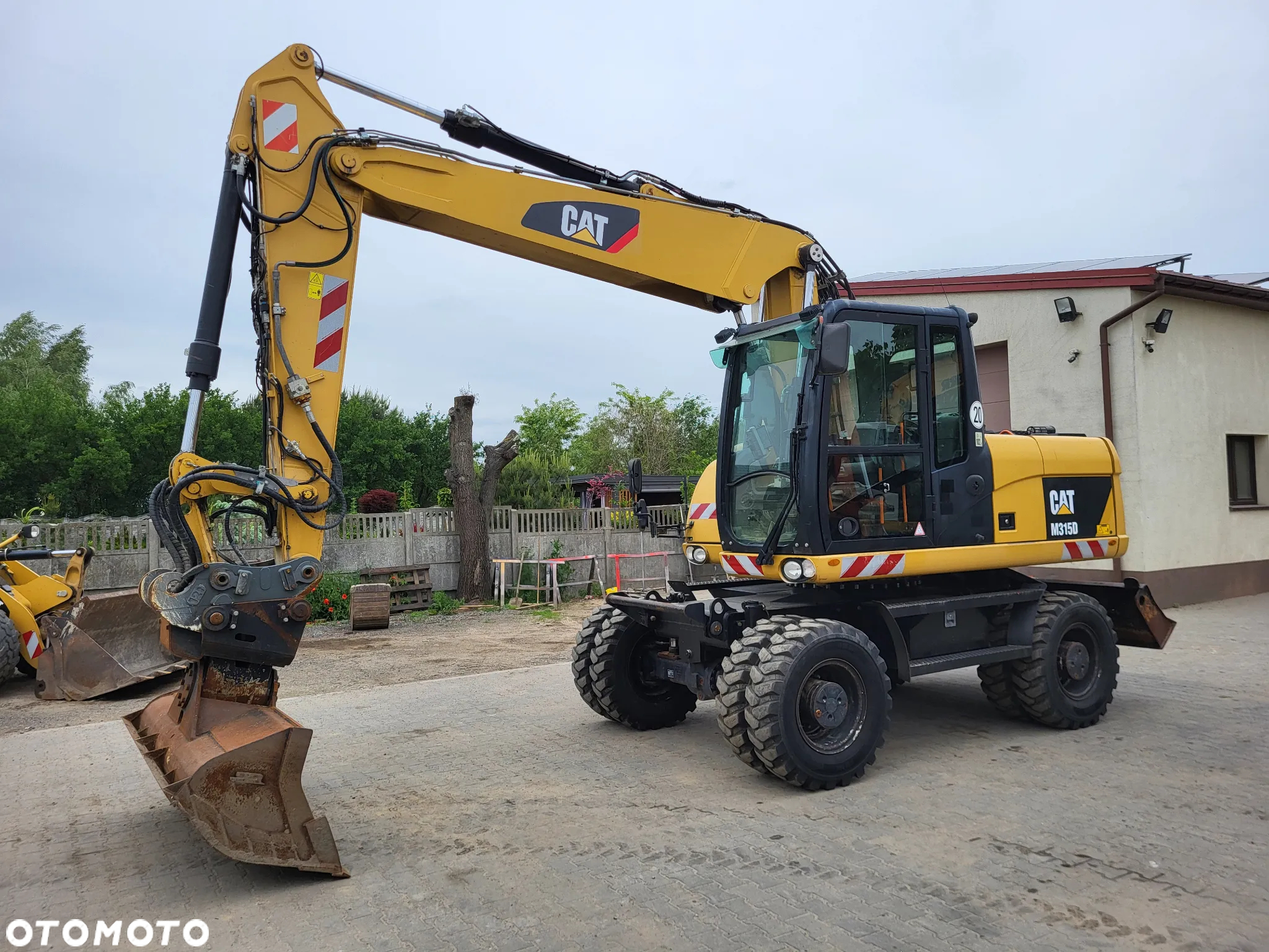 Caterpillar M 315D / z Niemiec / Stan idealny / - 2