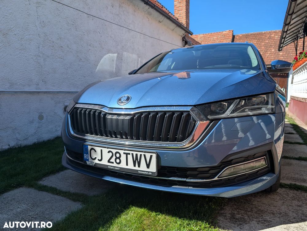 Skoda Octavia Combi 2.0 TDI DSG Exclusive Plus - 1