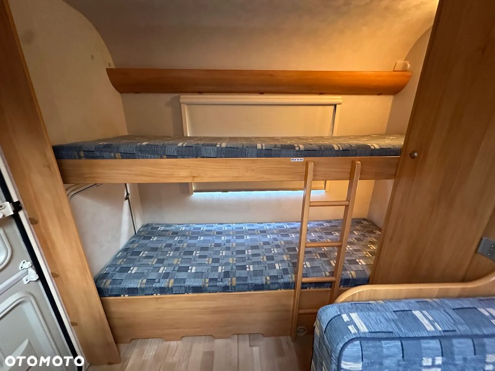 Adria ADORA 542 TK z przedsionkiem Isabella i łóżkami piętrowymi. - 36