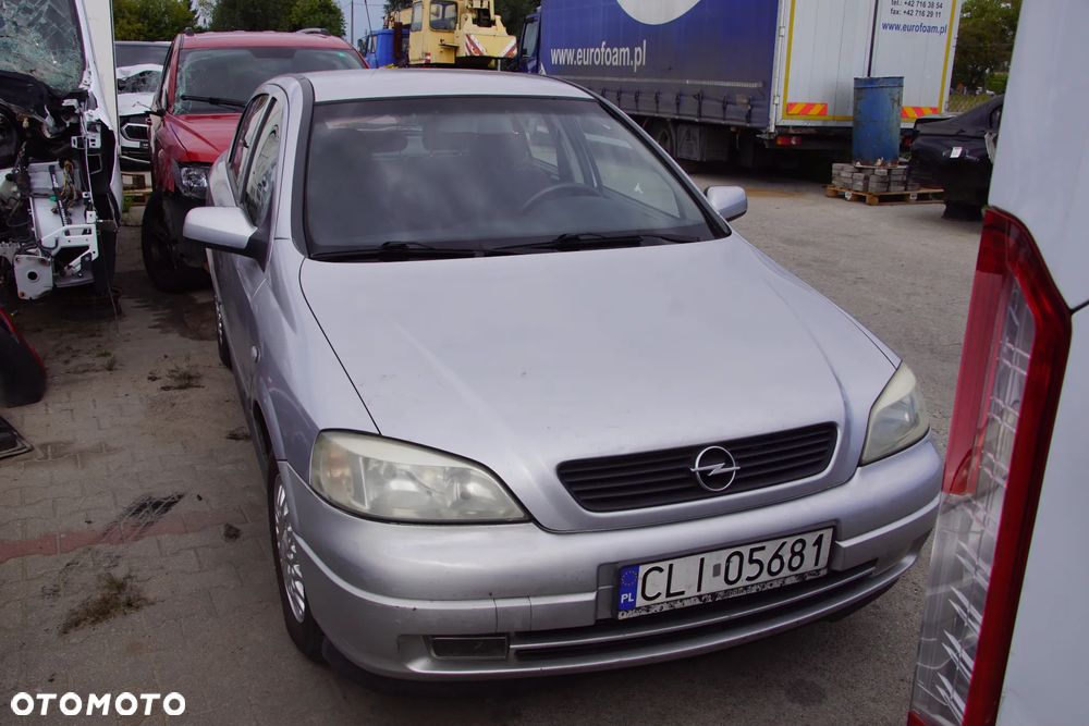 Auto na części - Opel Astra II G 1.6 16V 101 KM X16XEL F17 Z147 1999R Silnik Skrzynia Drzwi Maska Błotnik Zderzak Klapa Lampa Lusterko Klamka Szyba Deska Kokpit Sterownik Moduł Czujnik Licznik Panel Kierownica - 8