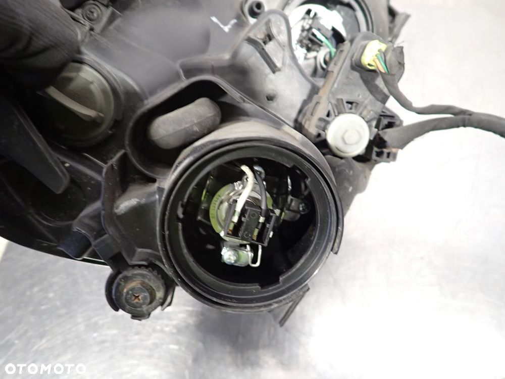 LAMPA LEWA PRZEDNIA KIA CARENS III - 11