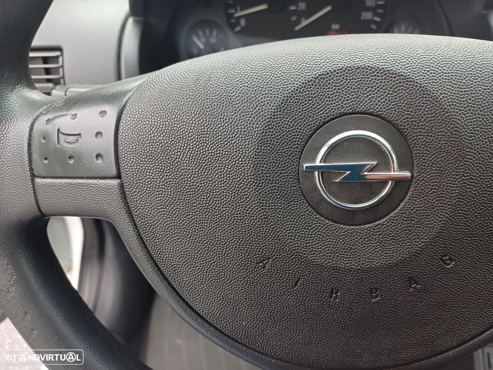 Opel COMBO 1.3 CDTI 75 CV - AR CONDICIONADO - 23