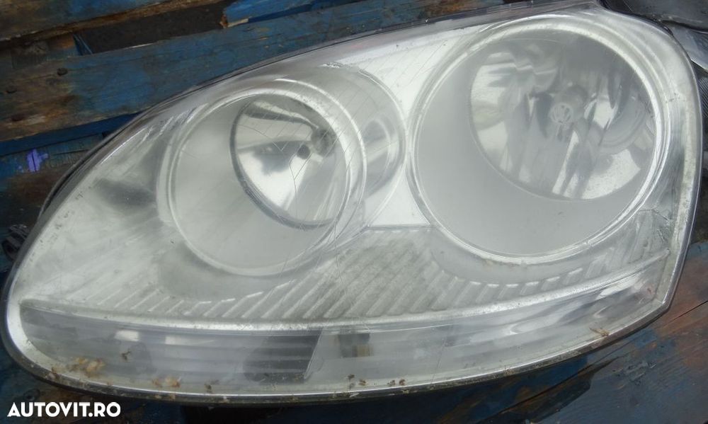 Far stanga Volkswagen Golf 5 din 2008 volan pe stanga - 1