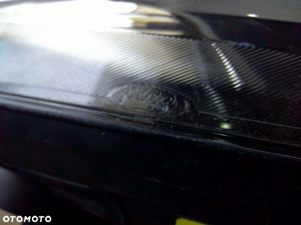 ford fiesta mk7 lampa przód lewa nowa oryg z uszk - 4