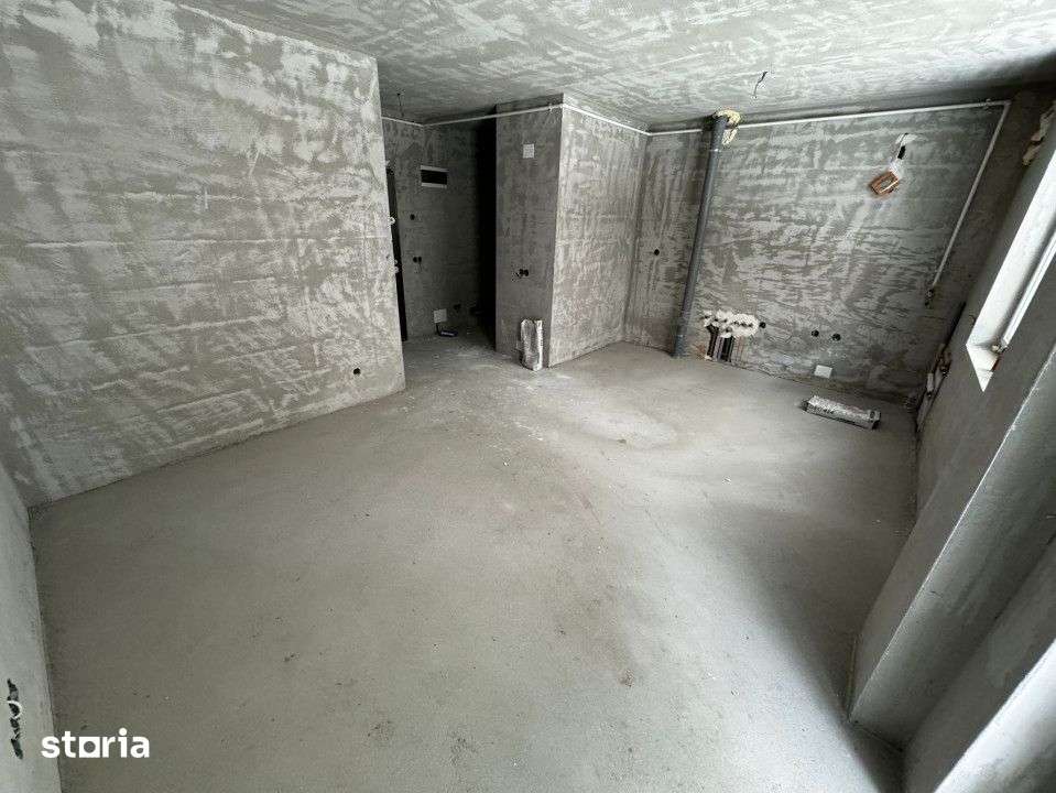 Apartament de 3 camere Finisat 63,80 mp, terasa 73.5 mp, zona Muzeul A — fotografia 2