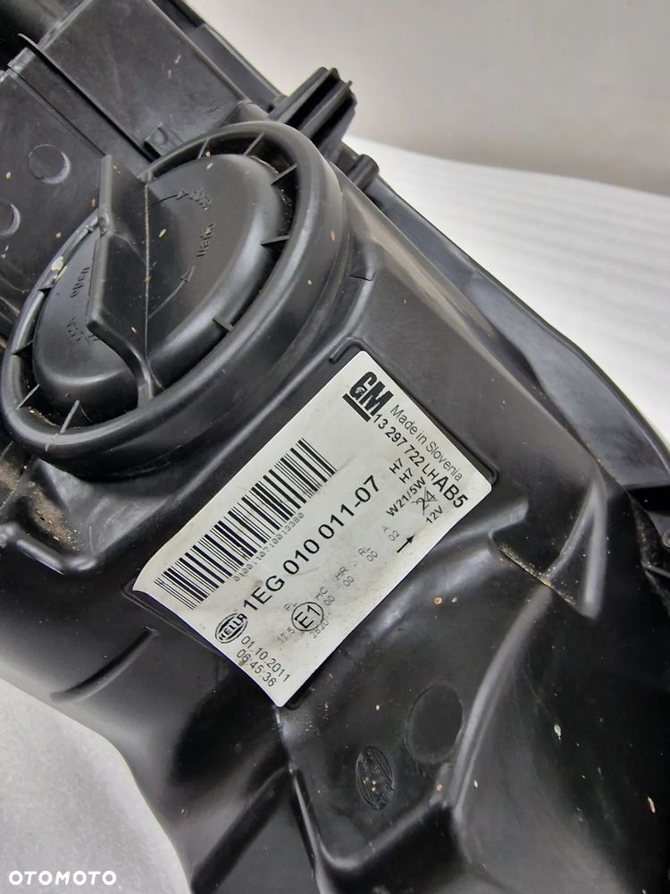 OPEL ASTRA J IV 08-12 LEWA ZWYKŁA CZARNA LAMPA PRZEDNIA PRZÓD , NR 13297722 , NR AUKCJI LL388 - 17