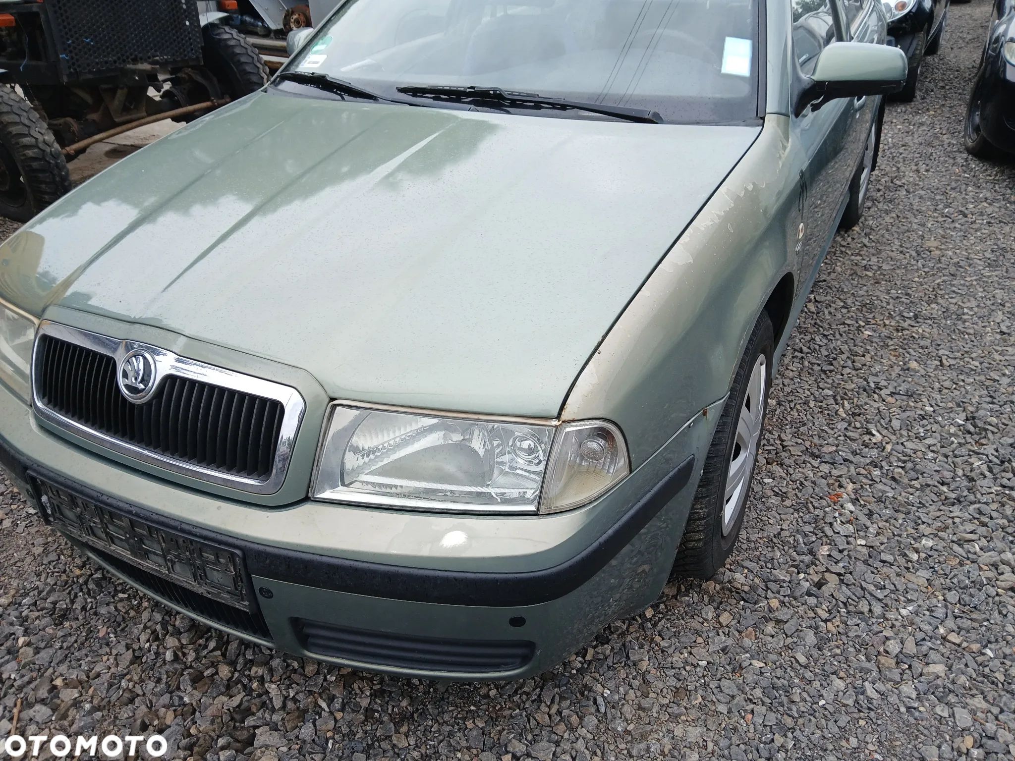 skoda octavia I HB fotel fotele kanapa deska kokpit podsufitka boczek boczki klamka podłokietnik - 1