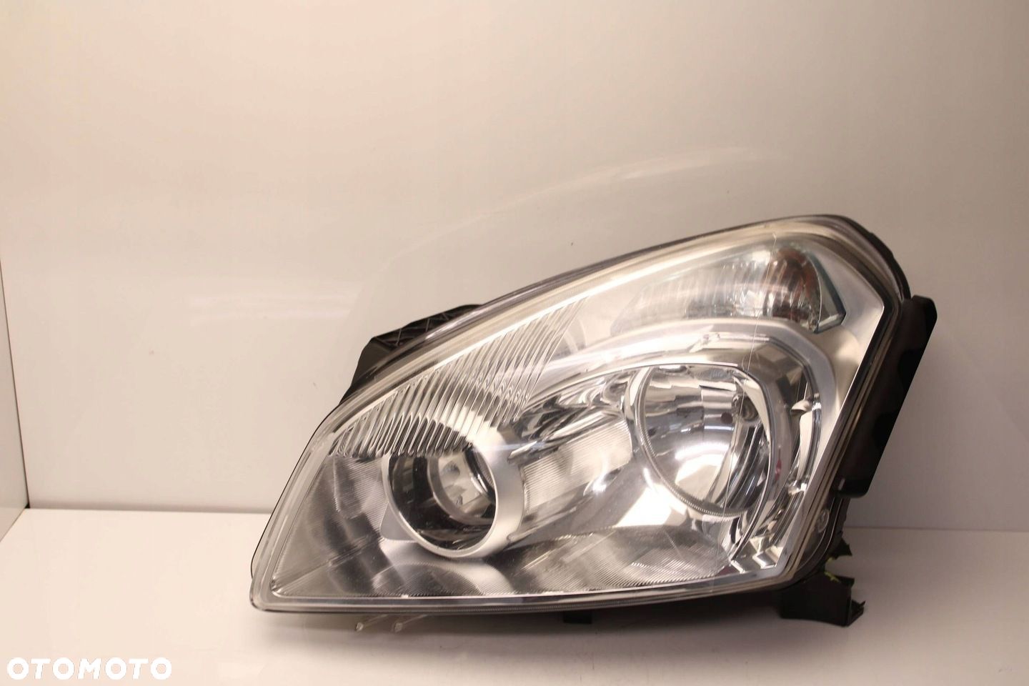 NISSAN QASHQAI J10 06R- REFLEKTOR PRZEDNI LEWY LAMPA LEWA PRZÓD - 1