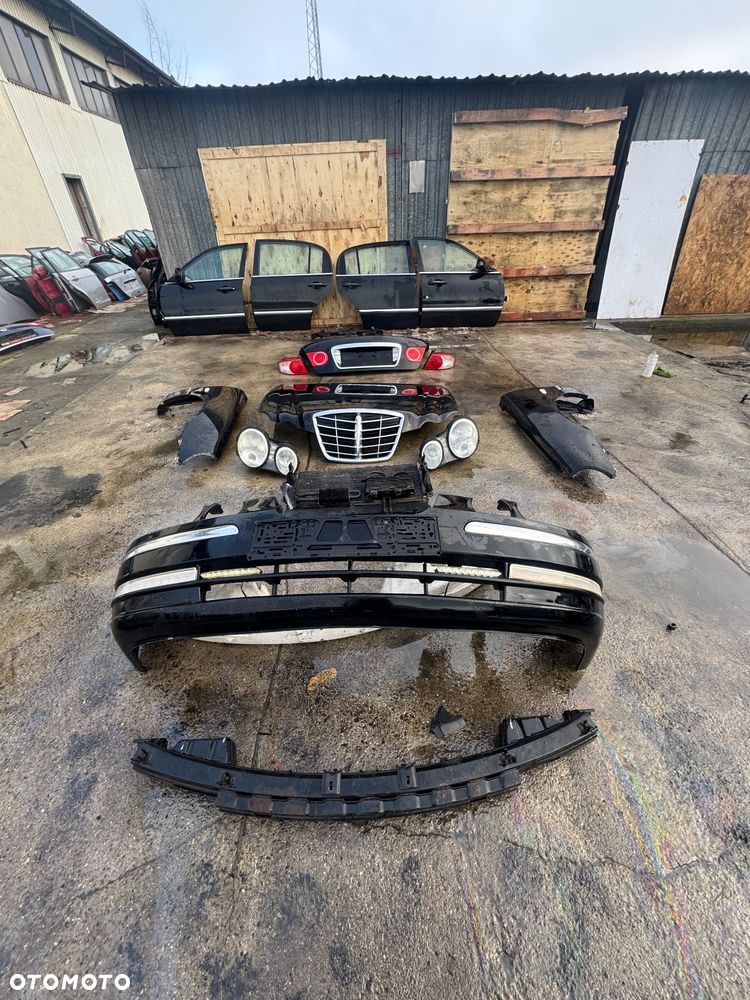 Kia opirus  kolor czarny drzwi praw lewe przednie tylne tył przód lusterka lusterko R8 klapa tylnia klapa bagażnika lampy tył tylnie prawa lewa prawy lewy maska lampa przód przednia xenon no xenon chłodnice komplet wody klimy belka przód zderzak przód przedni - 1