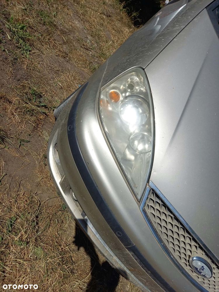 części LAMPY PRZÓD prawa lewa Ford Galaxy I fl lift 2004r. 1.9 tdi - 1