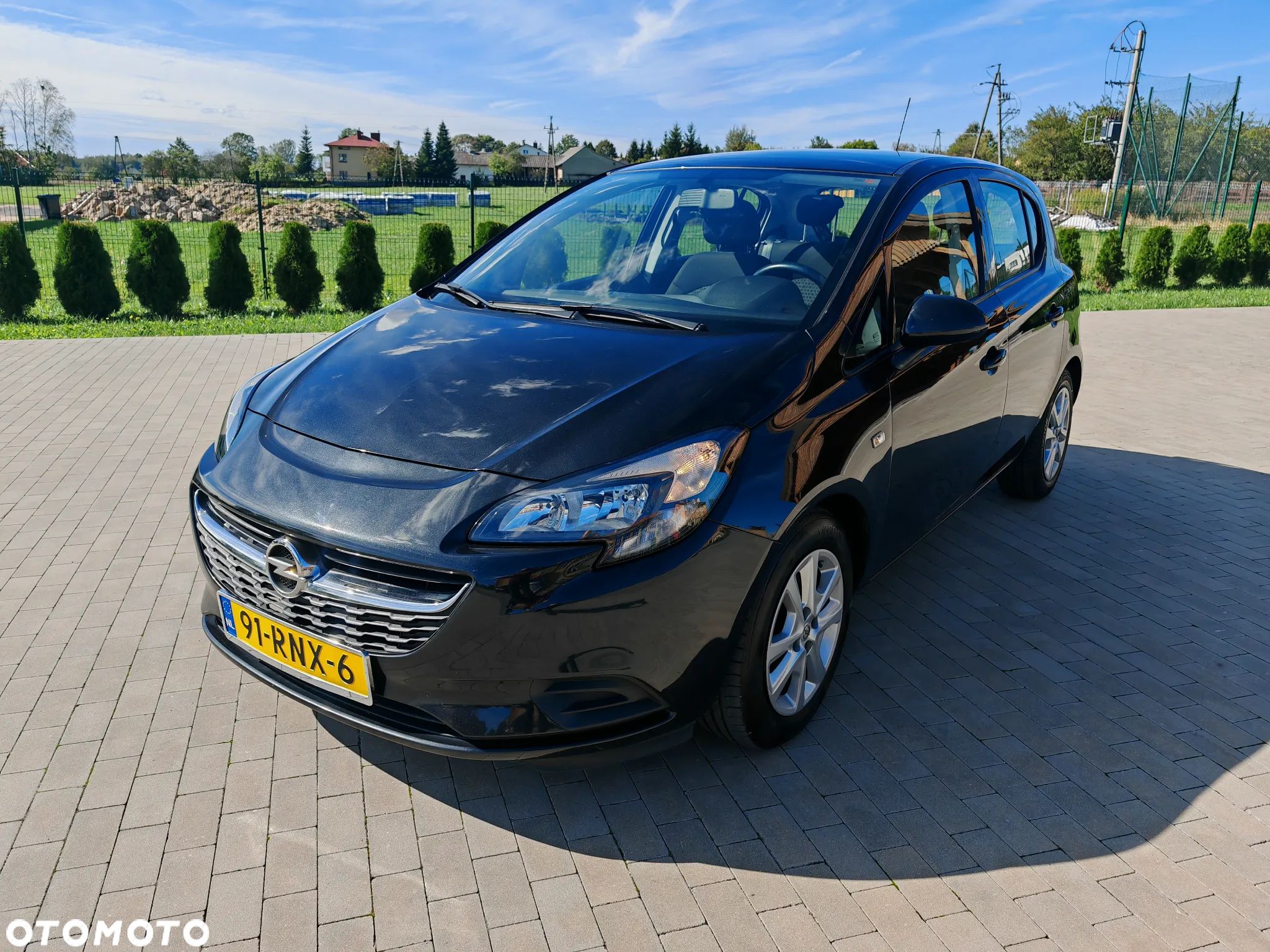Opel Corsa 1.4 Enjoy - 1