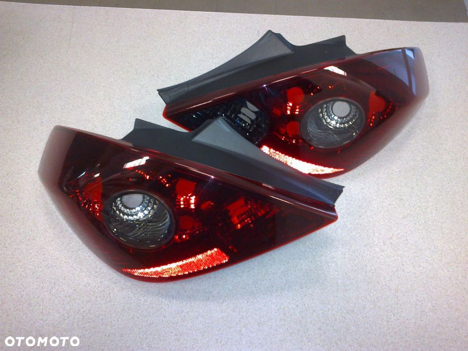 LAMPA TYLNA OPEL CORSA D 06-14 DYMIONA 3D NOWA - 1